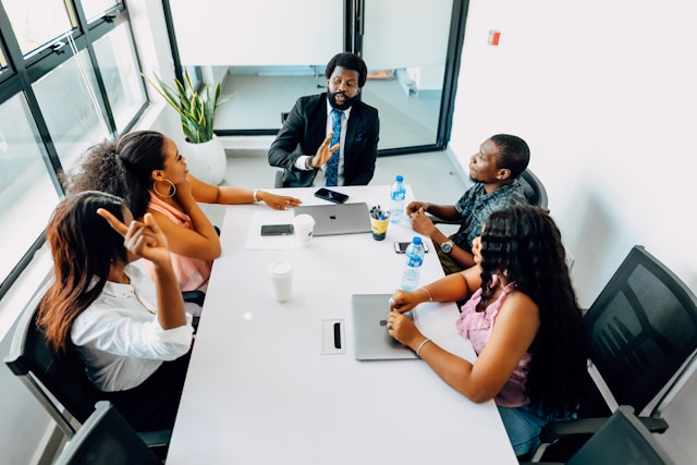 Young professionals working together around a table